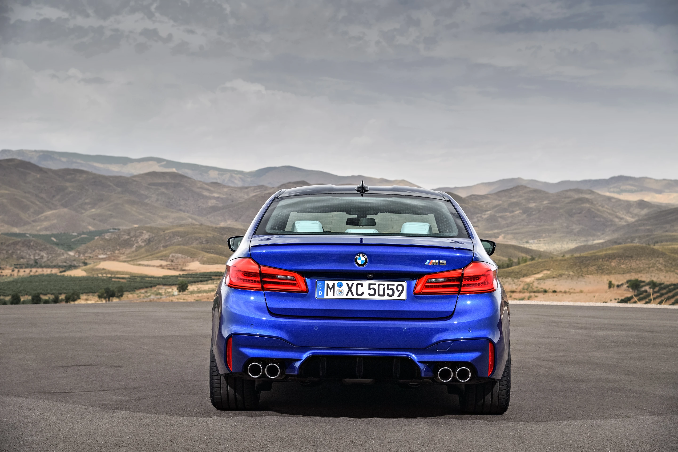 The quad exhaust pipes on the BMW M5