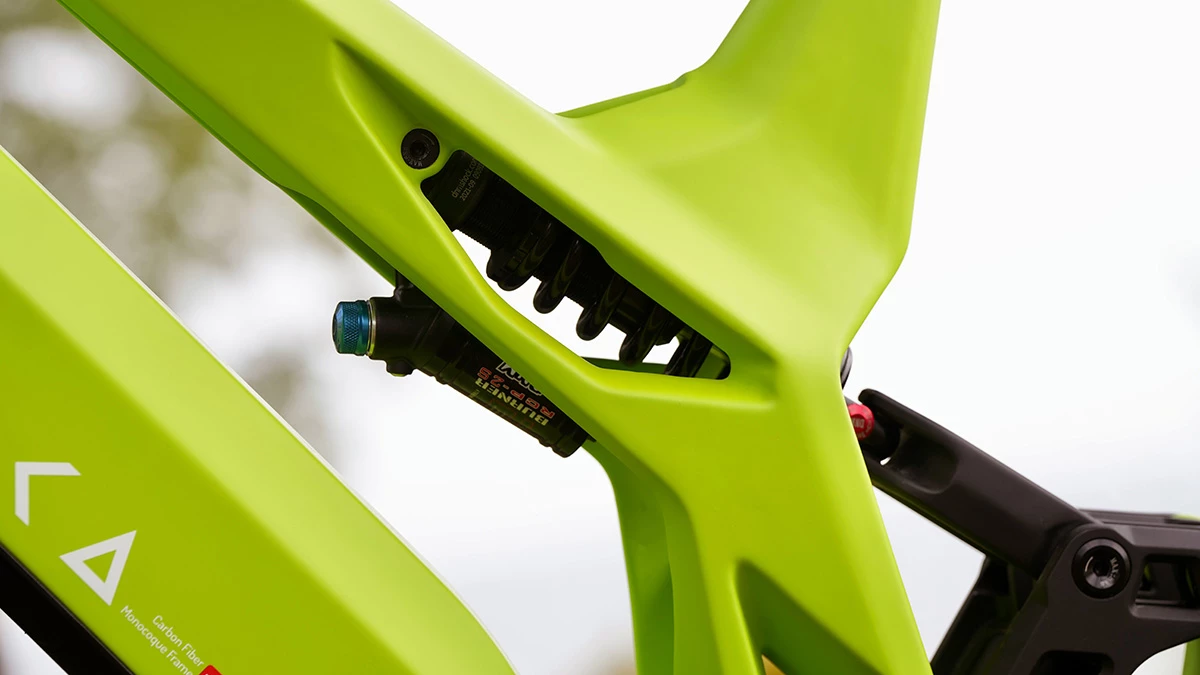 The 240 x 60-mm DNM rear shock is neatly integrated into the frame, while its rebound knob is fitted to be easy to reach and adjust