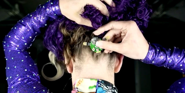 The controller is designed to sit at the back of a wearer's head