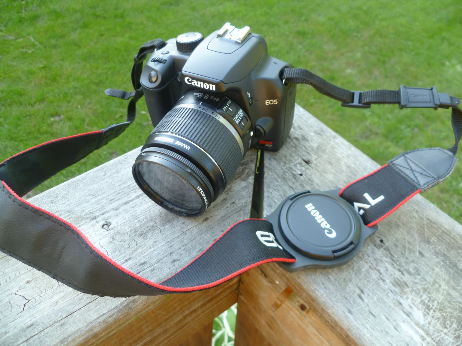 Mark Stevenson has designed a simple solution to allow photographers to secure a lens cap to a camera strap or camera bag between shots