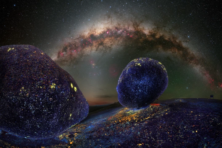 Astro Landscape Runner-Up: Troy Casswell – "Bald Rock Panorama." Casswell's innovative use of UV light brought out the rock formations and Milky Way in an impressive blend of technique and creativity