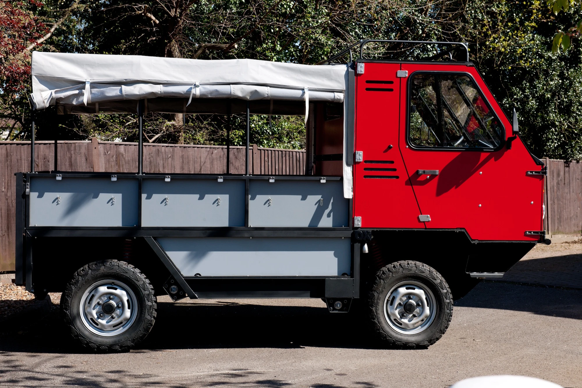 Six ready-to-assemble OX units (including engine and transmission), will fit into a standard shipping container when flat-packed