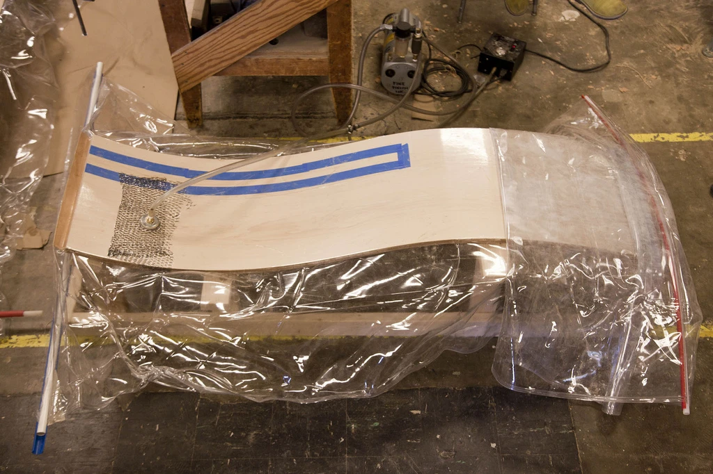 Two zipshape panels were then interlocked together to form a curved structure, glued together and vacuum-sealed in plastic bags