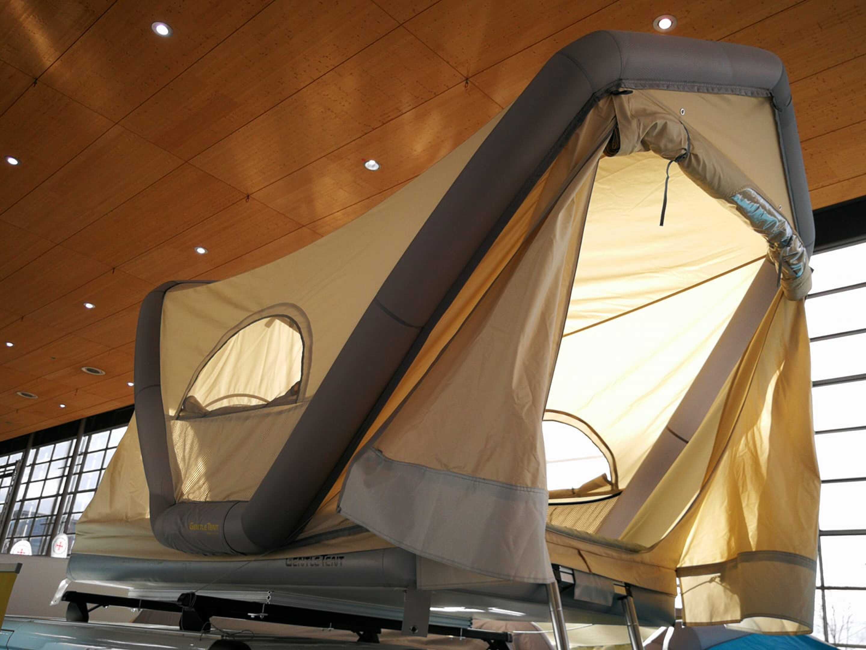 Inflatable rooftop tent camps on your car or in the water