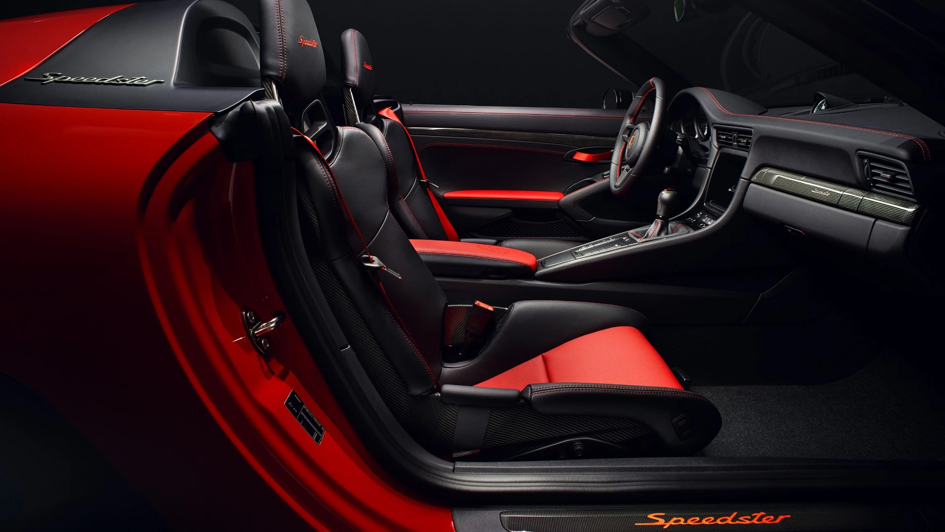 Modern interior touches include the upgraded leather with red highlight stitching shown here