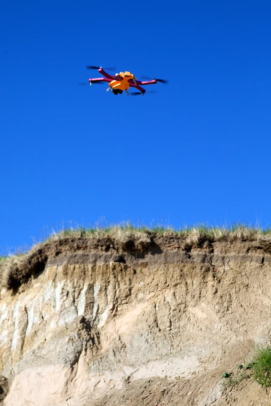 The AirDog features auto-pitch and yaw camera follow, horizon alignment and vibration isolation