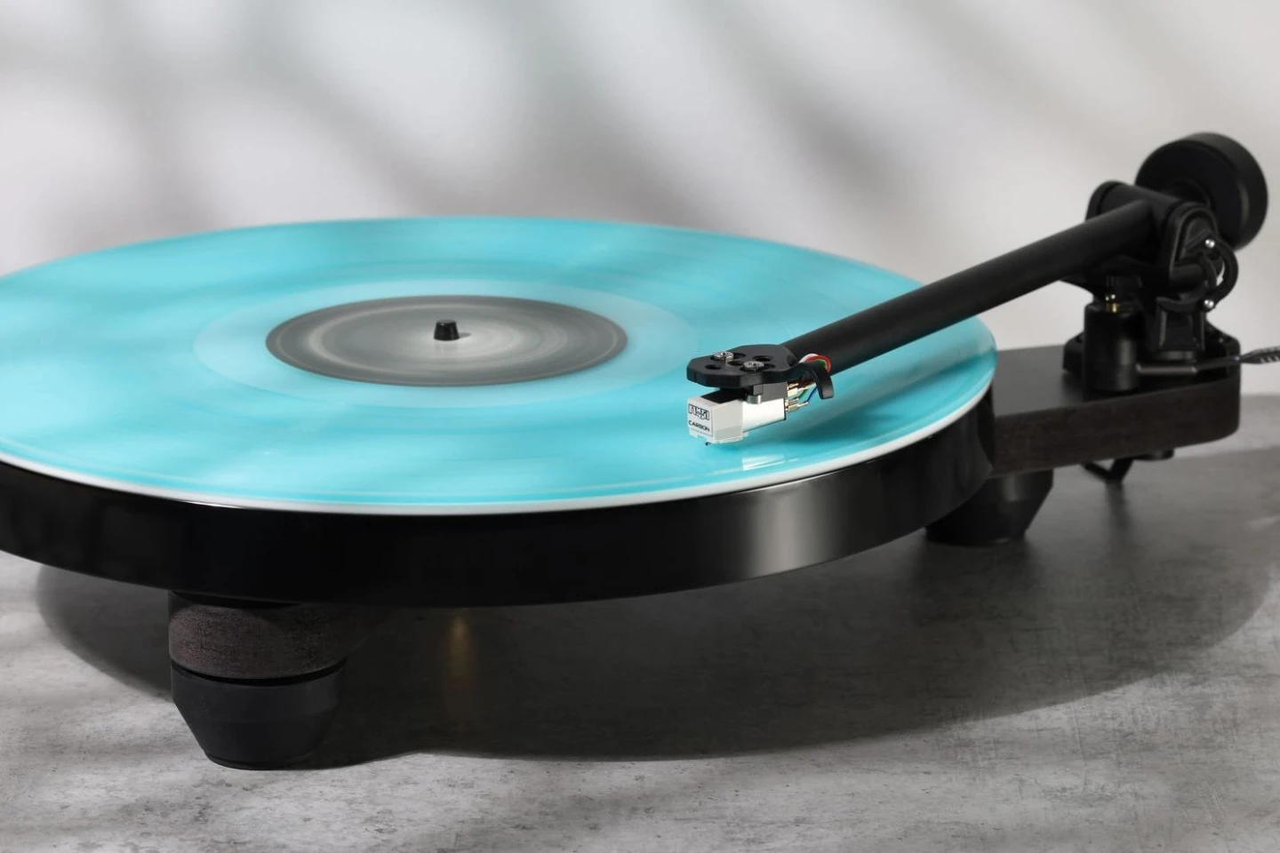 Rega strips the turntable to its bare essentials and halves the price