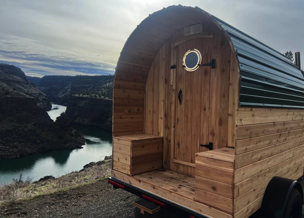 You might not be able to see much inside the trailer, but the towable Saltsaun can deliver some very nice views from its exterior seats