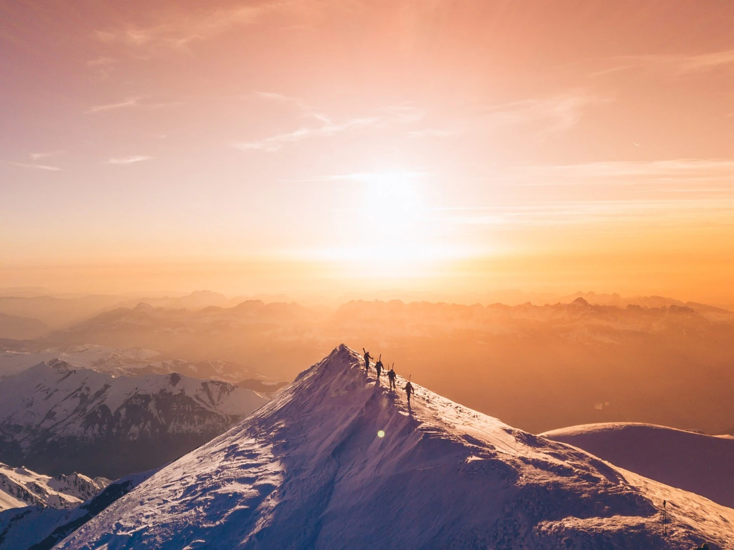 Another Nominated Entry prize winner, several skiers walk the summit of Mont Blanc before skiing down the north face