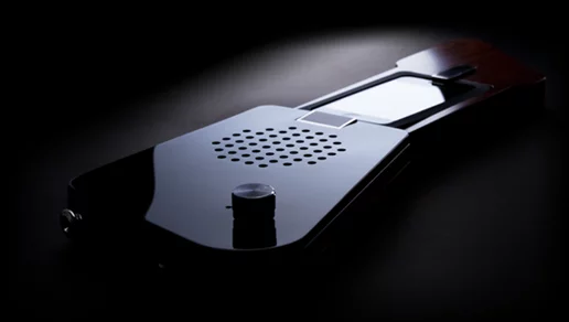 The volume control next to the 3W speaker
