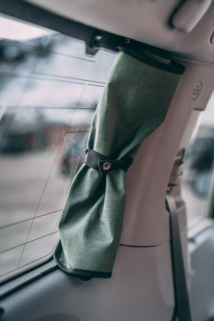 The window shades roll up during the day