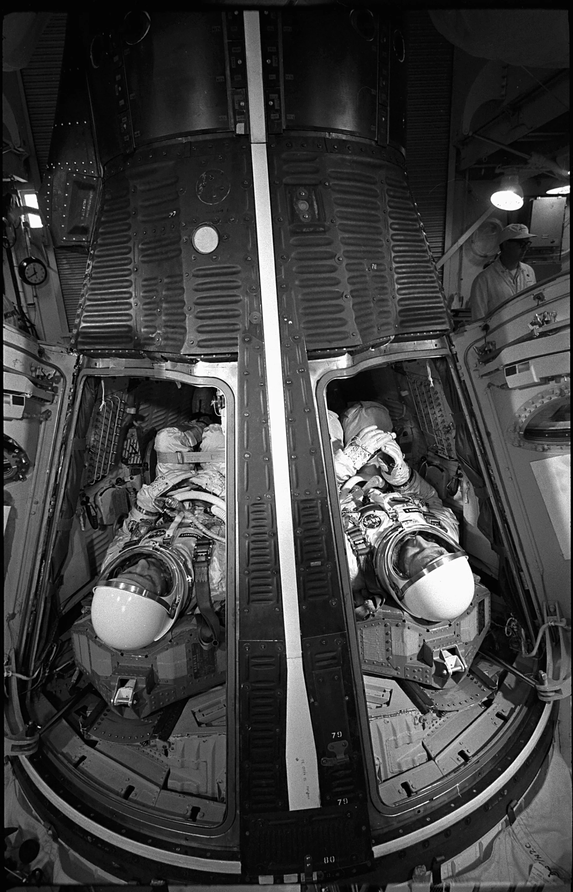 Astronauts James McDivitt and Ed White running through a simulated launch (Photo: NASA)