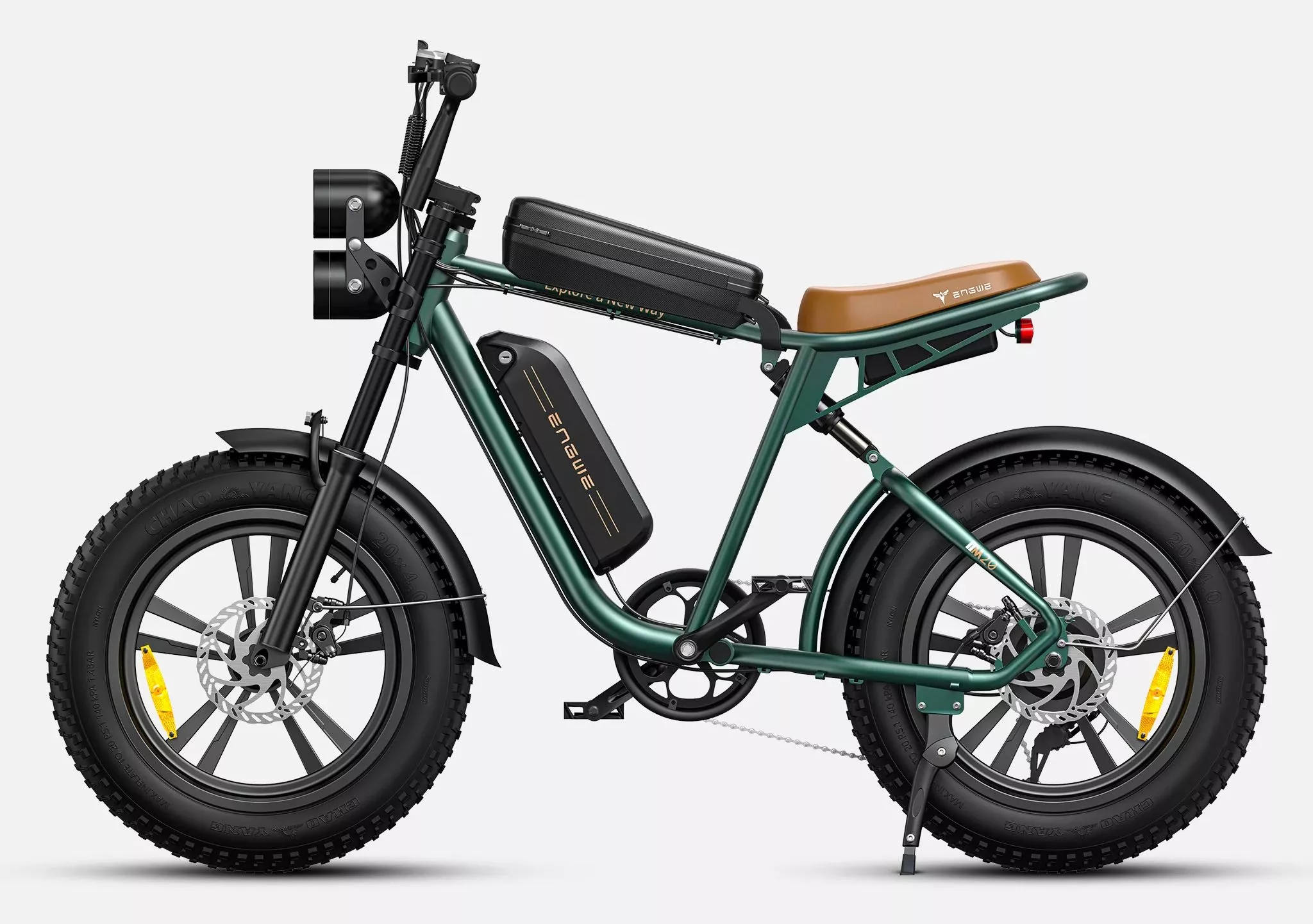 A green-framed M20 with rack bag mounted to the top tube, and rocking a tan-colored padded seat