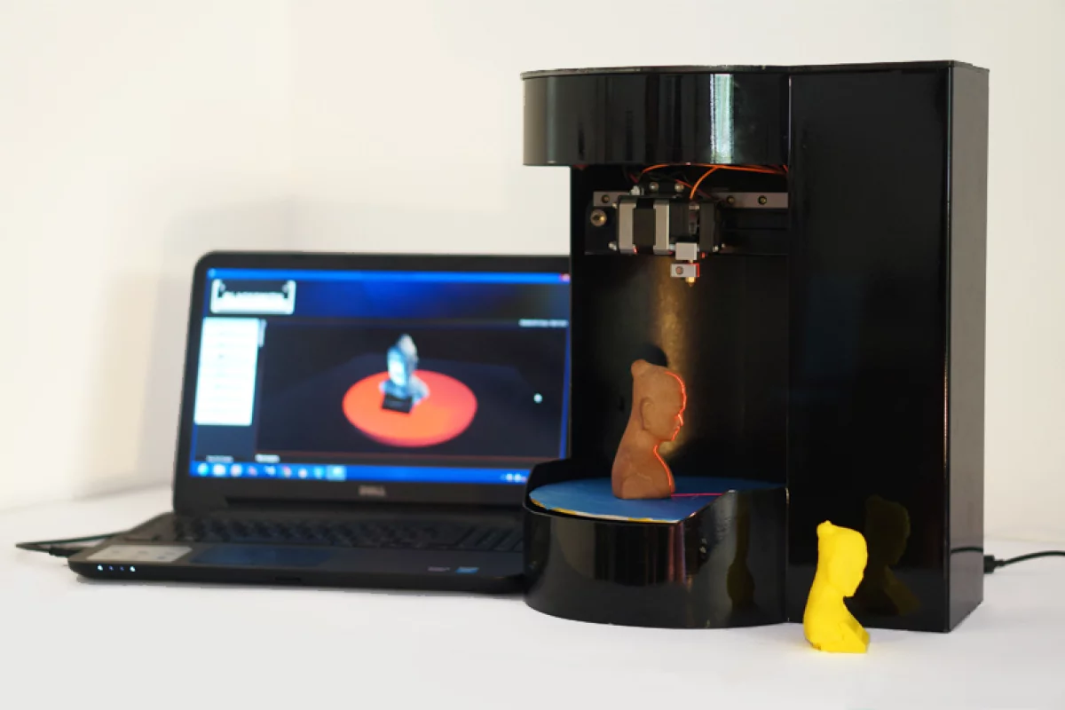 The Blacksmith Genesis all-in-one 3D printer, scanner, and copier boasts a compact size and simple operation thanks to its use of a rotary platform