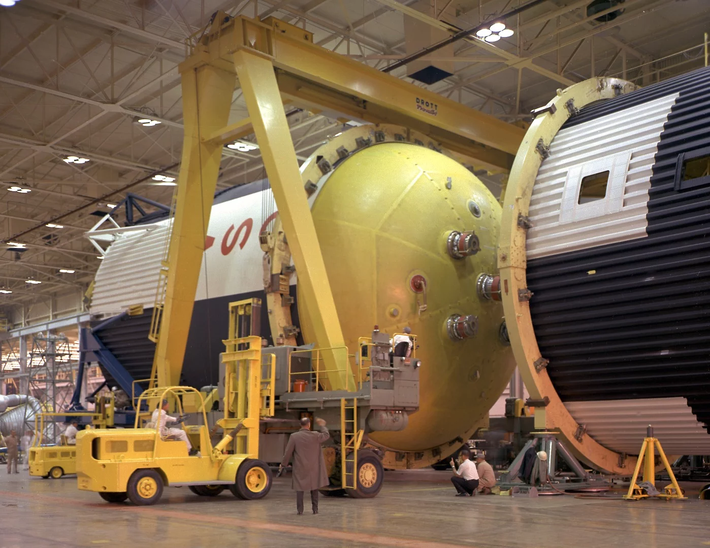 Fuel tank being installed on the Saturn V first stage