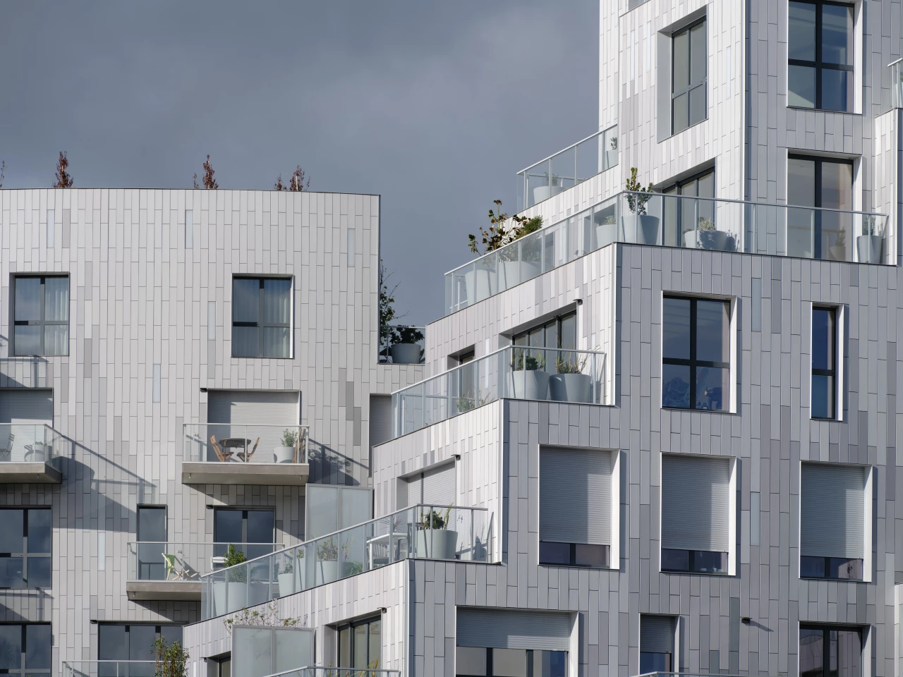 Ascension Paysagère doesn't look all that green right now, but its exterior has been planted with large amounts of greenery which will eventually grow and break up the gray exterior