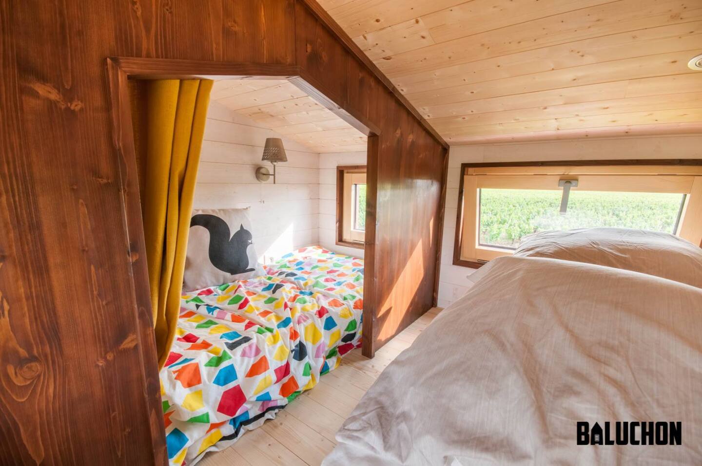 The Pampille's loft bedroom features a removable partition that can be used to divide the space to create a small room suitable for a child