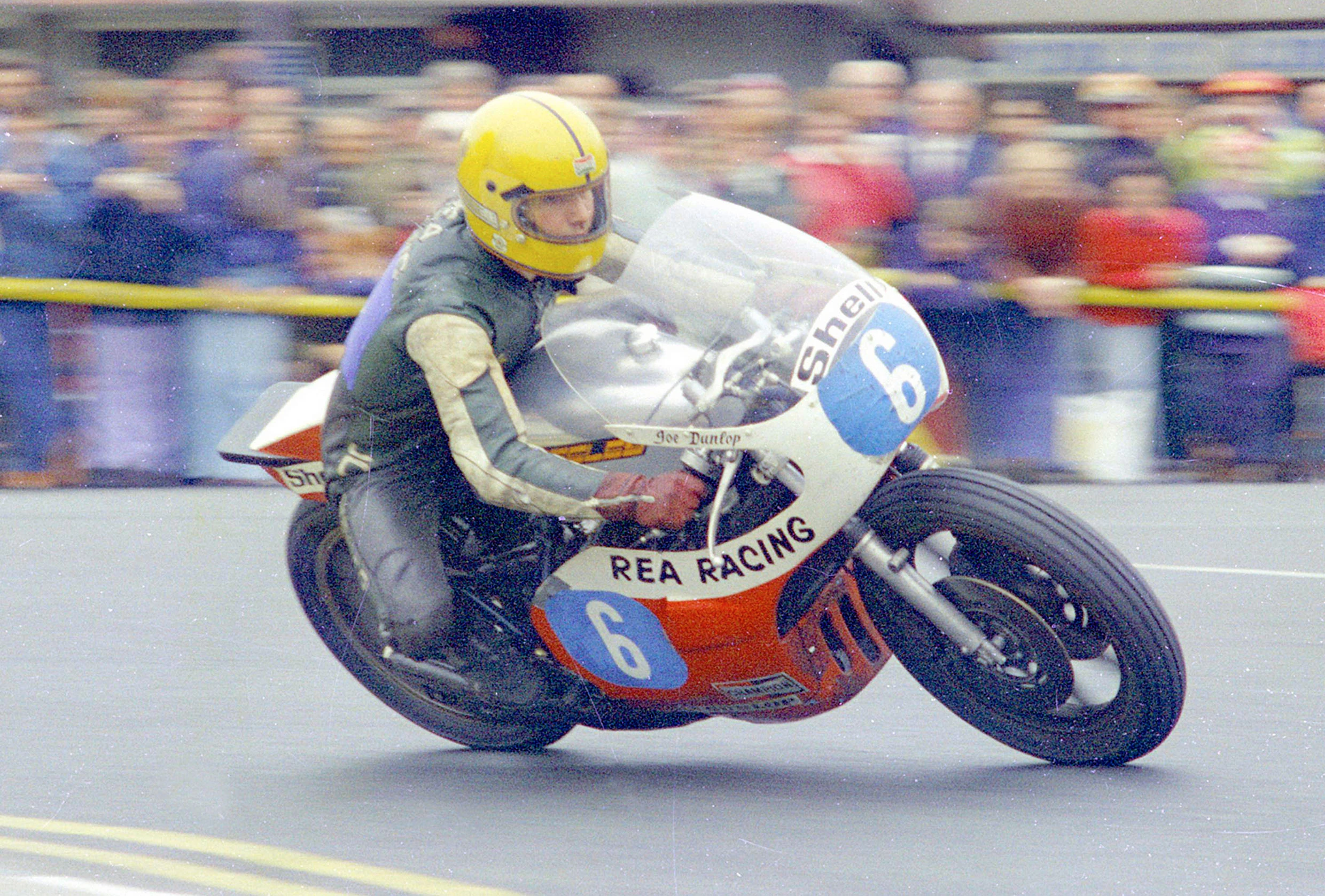 Joey Dunlop on the TZ700 ran 115 mph in 1980 - weather permitting, that record is likely to be beaten next year