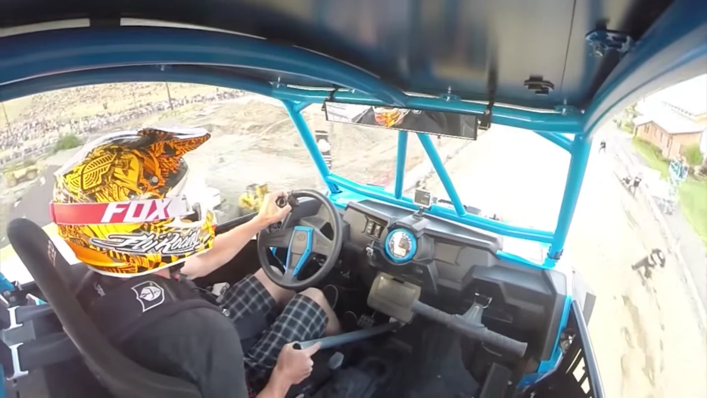 Yes, he's using that stick to flat-out poke the pedals