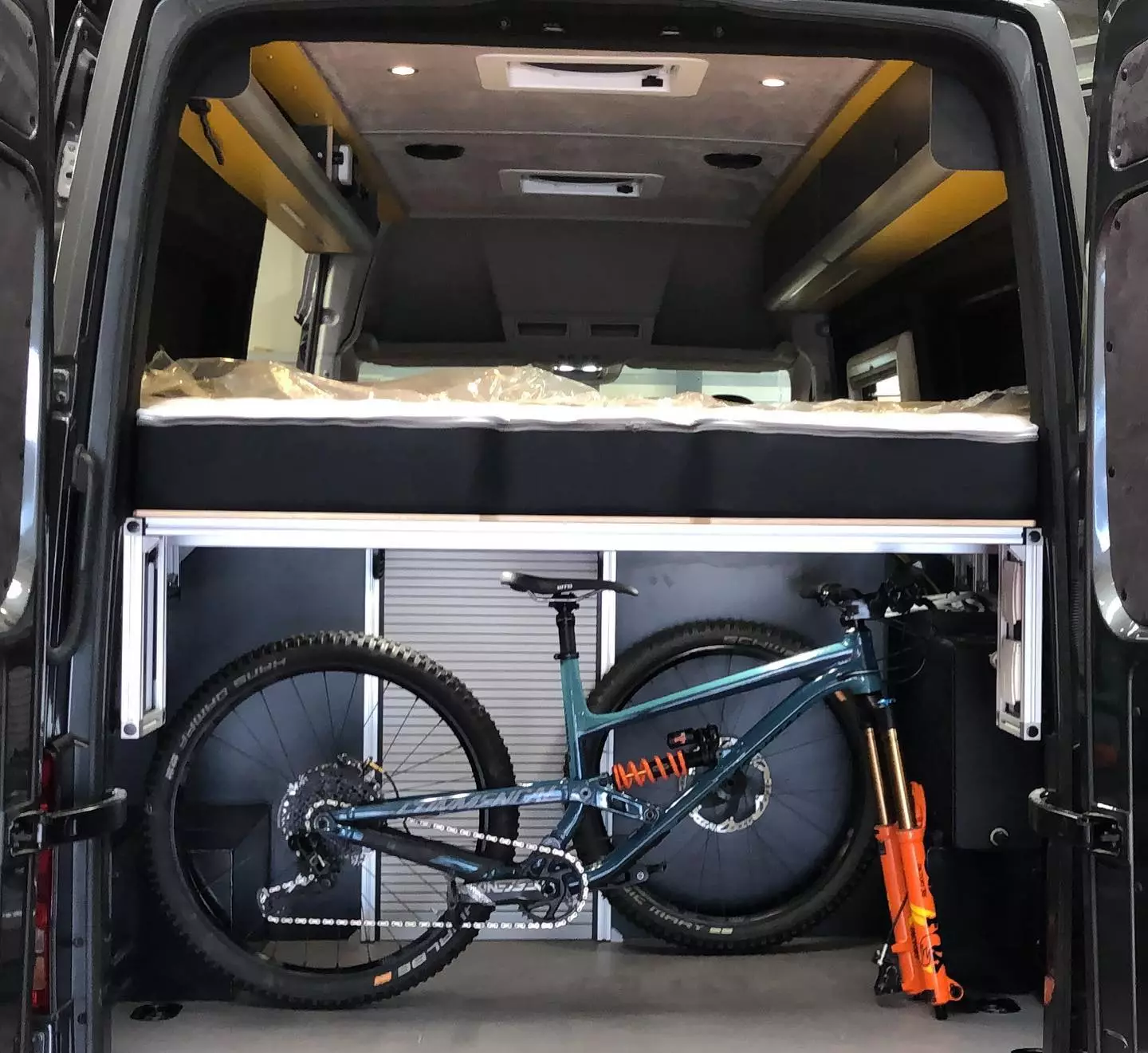 The Vanworx Maxxtrax's under-bed garage area fits luggage or gear