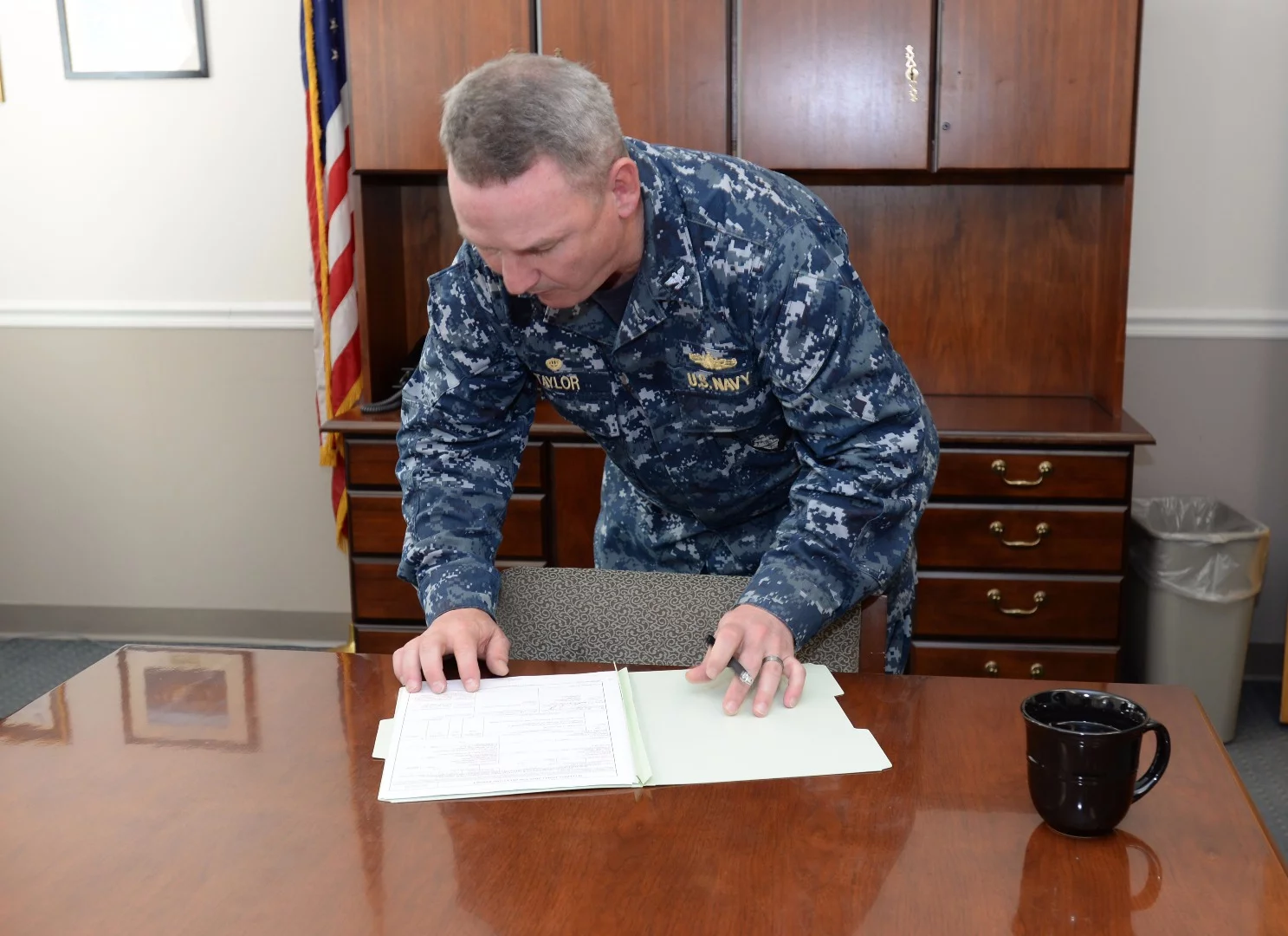Captain Michael Taylor takes formal possession of the Zumwalt on behalf of the US Navy