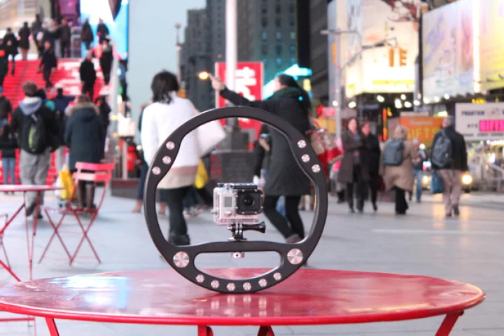 The SteadyWheel is a circular stabilizing rig for video cameras