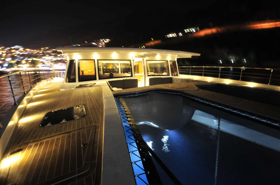 Solarwave 64 at home on the water by night