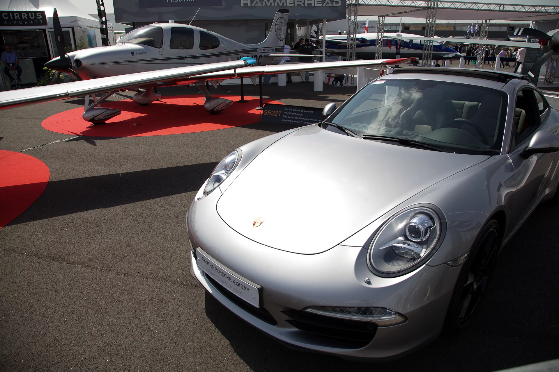 A Porsche 911 joined the air-going craft at the Cirrus Stand (Photo: Noel McKeegan/Gizmag)