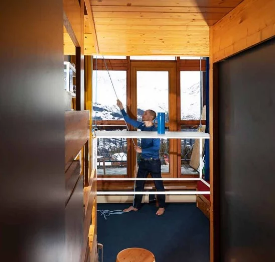 Coudamy sought to preserve the retro interior design, while enhancing the 19-sq-m (205-sq-ft) apartment with some fresh space-saving upgrades