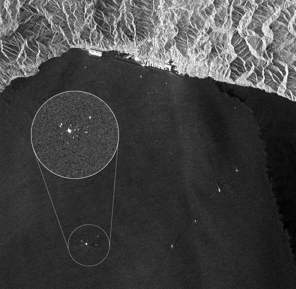 This Sentinel-1A image was acquired on 26 July 2014 over the coast of northwestern Italy while the Costa Concordia cruise ship (enlarged) was being towed towards the city of Genoa (Image: ESA)