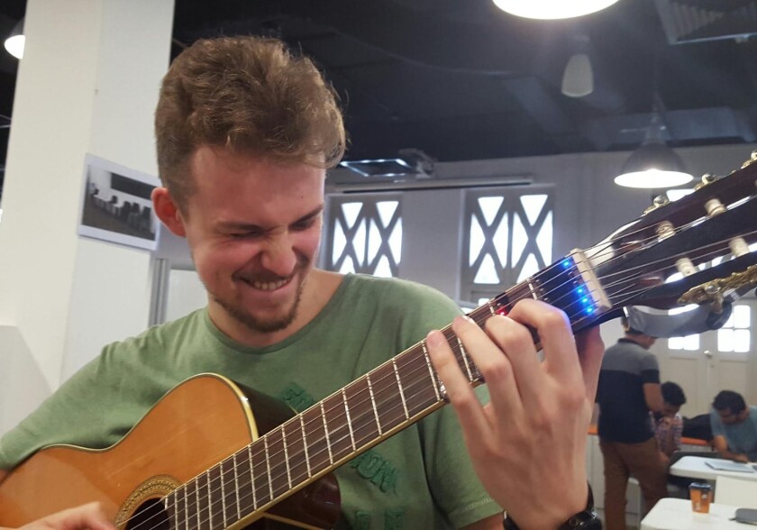 The chord shapes of songs are supplied by a FretX mobile app running on a paired smarthone