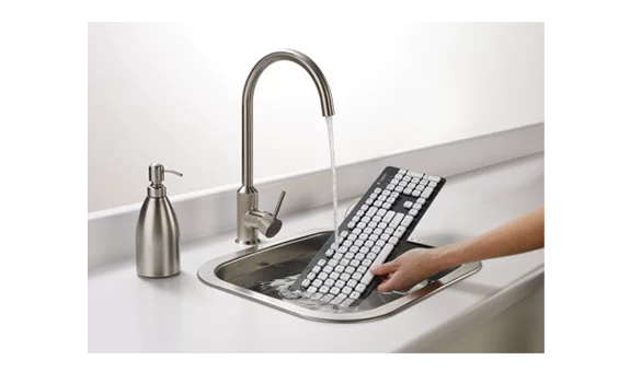 Logitech's new K310 washable keyboard is designed to be submerged in water so cleaning it is as easy as doing the dishes