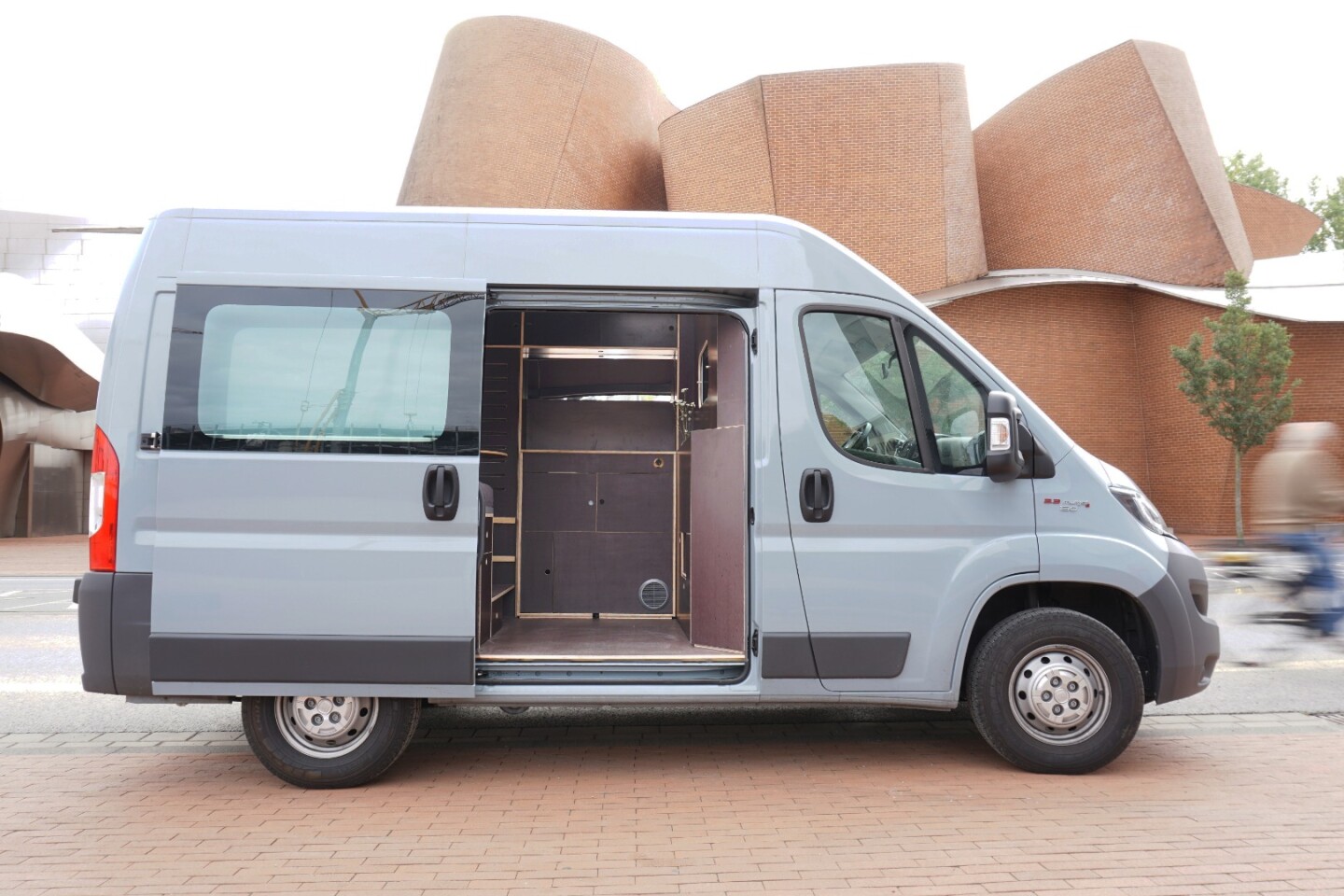 The Vanjoy campervan concept features a clean, minimalist design that makes maximum use of the working space
