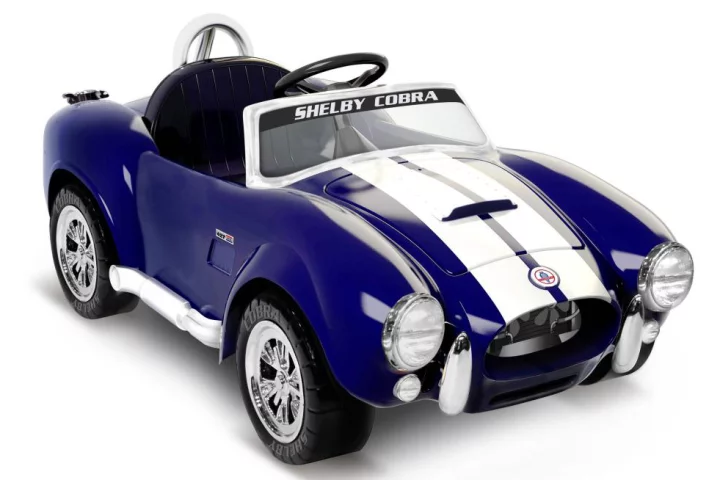 The Shelby Cobra 427 "ride on" travels at speeds of up to 5 mph (8 km/h)
