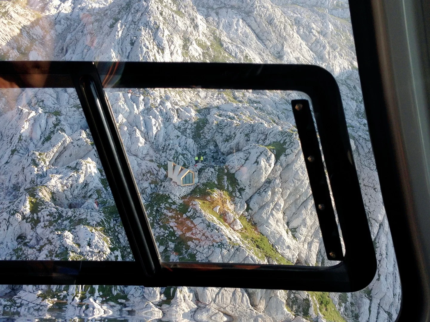 The Alpine Shelter sits along the cliff's edge of Mt. Skuta, Slovenia
