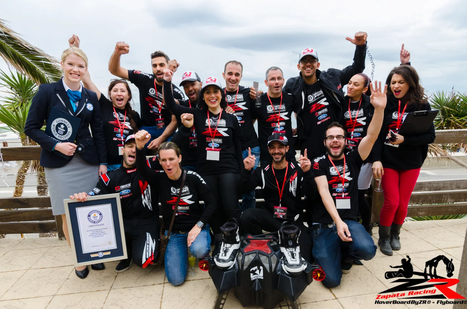 The Zapata Racing team celebrates a new world record for the farthest flight by hoverboard