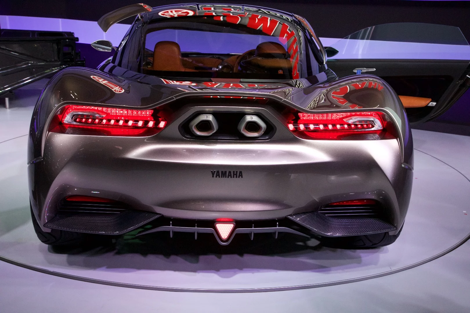 Two motorcycle-styled exhausts and a large diffuser take center stage in the Sports Ride Concept's rear