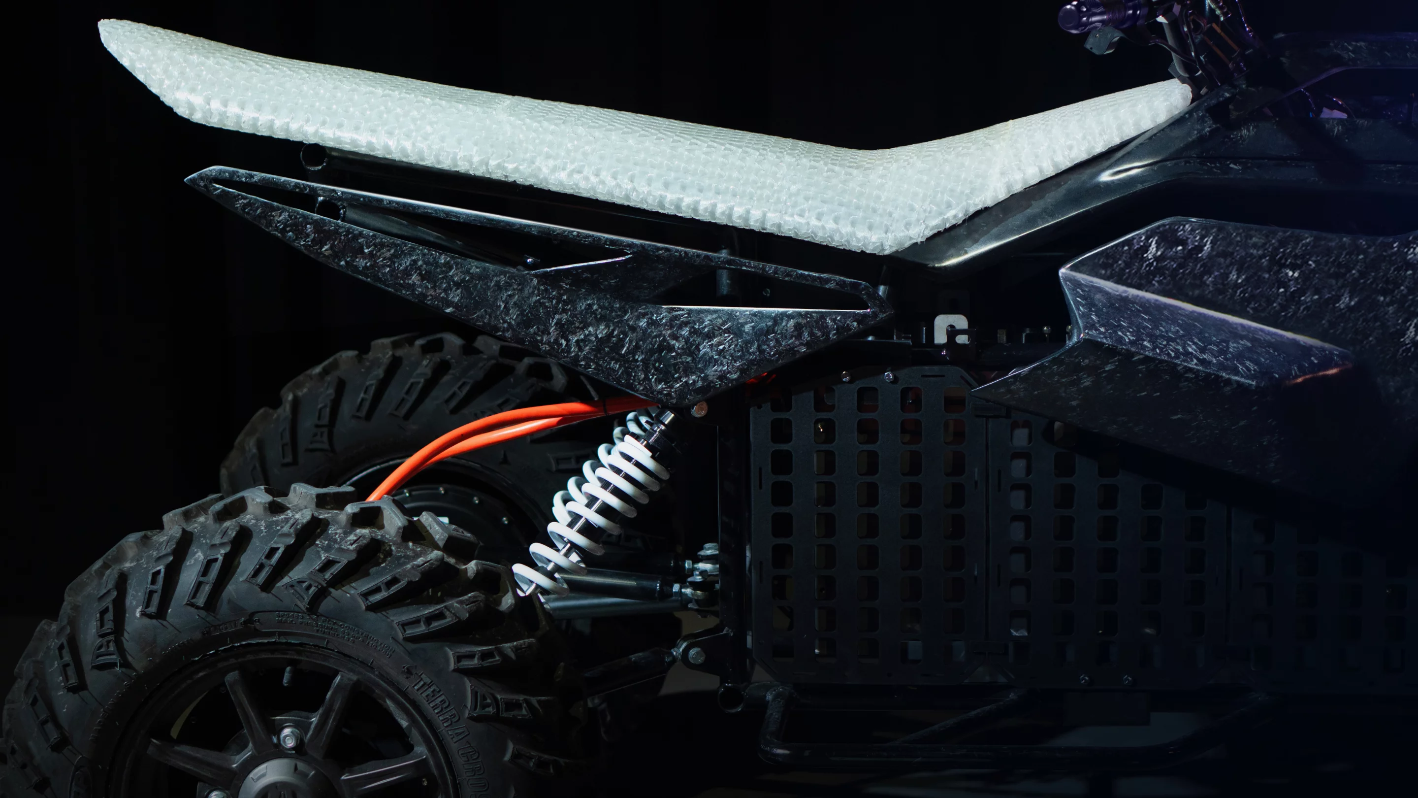 A close look at the Equad's coil-over rear suspension