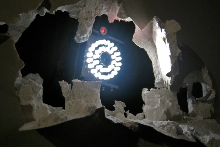 Accomplice is an artwork in which artificially intelligent robots gradually destroy a wall