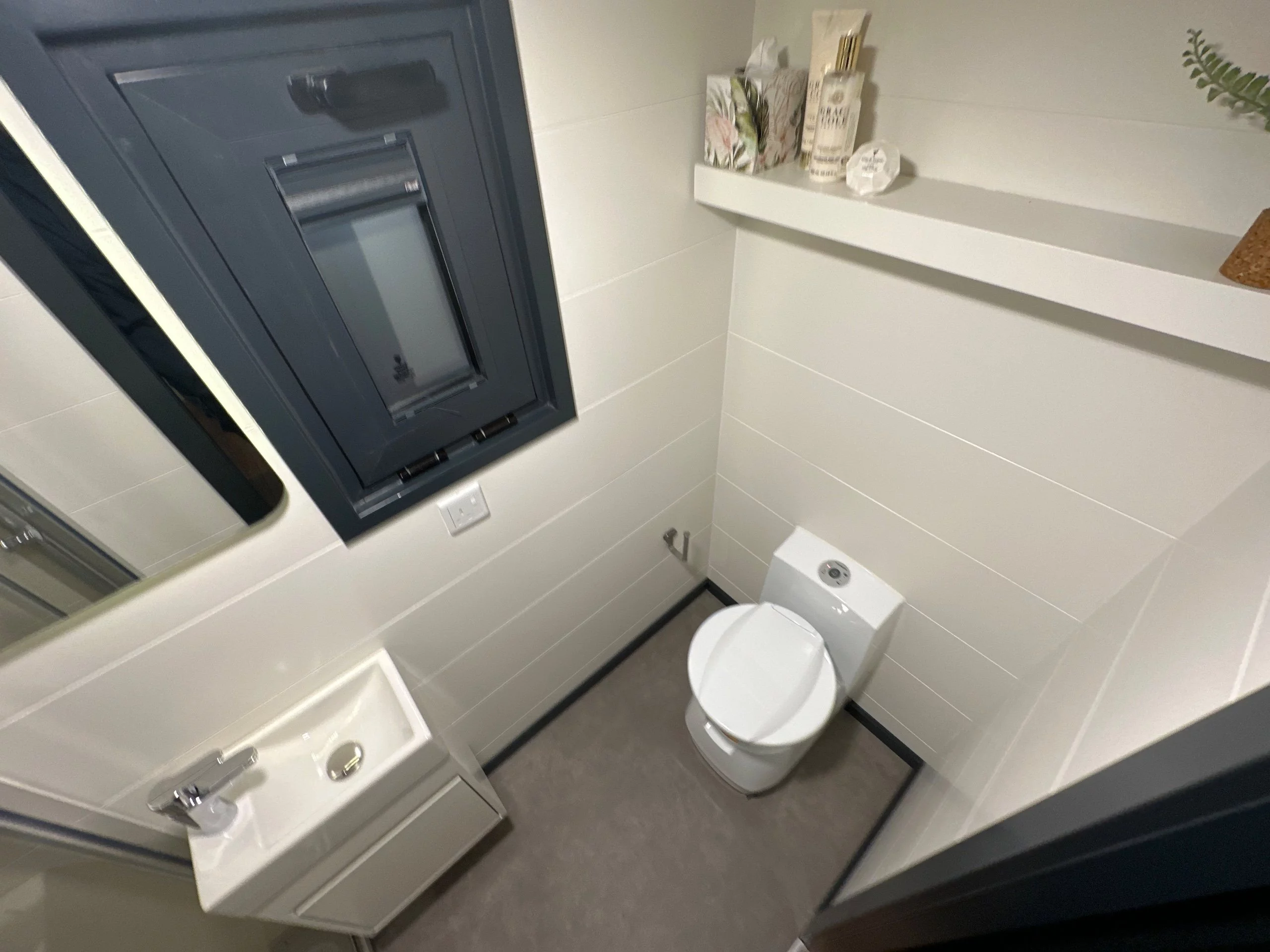 The Mo.5 450's bathroom features a camper-van-style cassette toilet