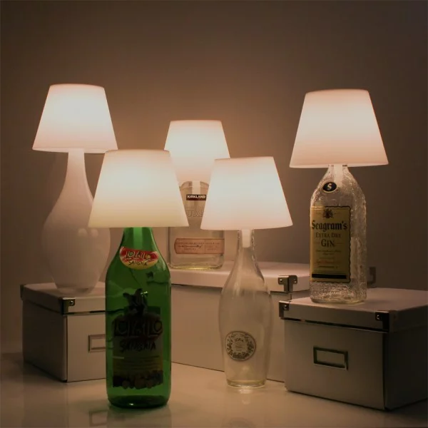 Different bottles complete the look of the Satechi Touch USB LED Lamp in different ways