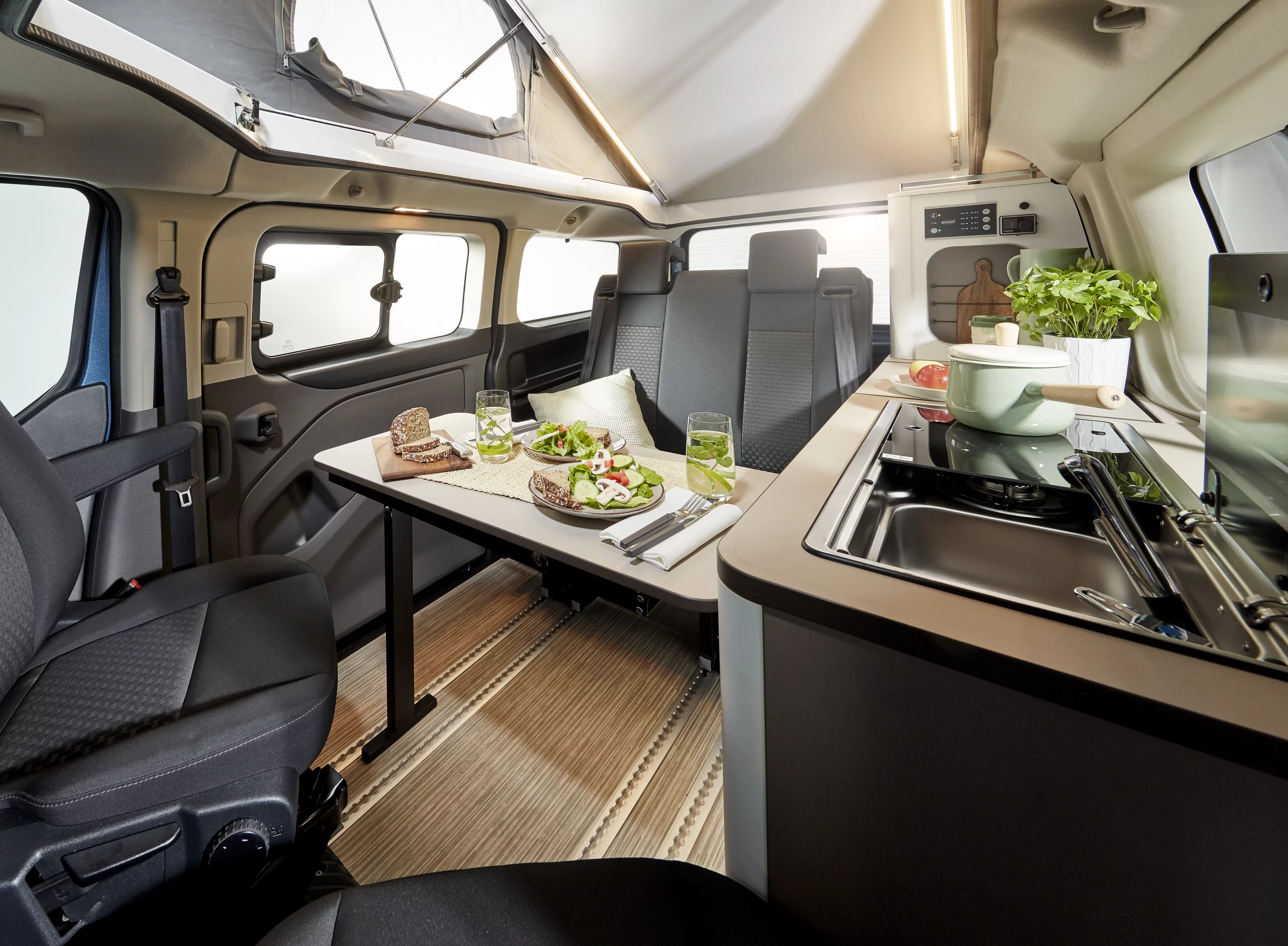 Dining set-up with swivel front seats and rear bench