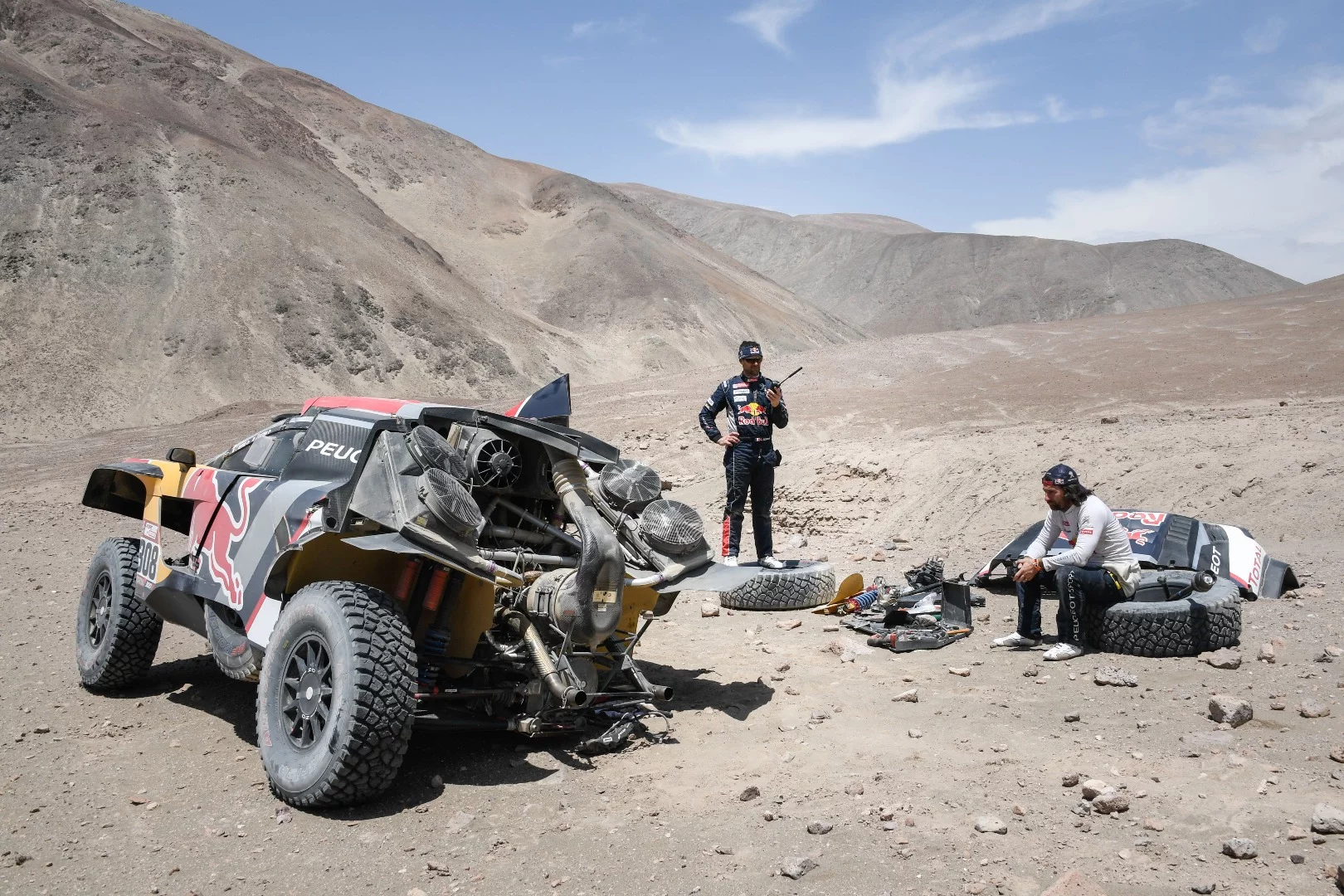 Four-time Dakar motorcycle champion Cyril Despres and his partner David Castera struggle with a major mechanical setback