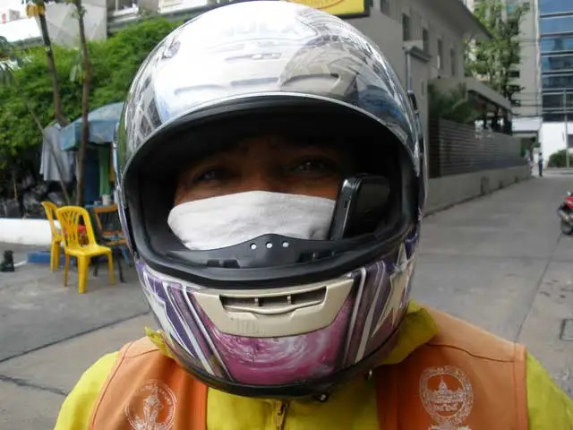 Bangkok helicopter pilot with makeshift hands-free