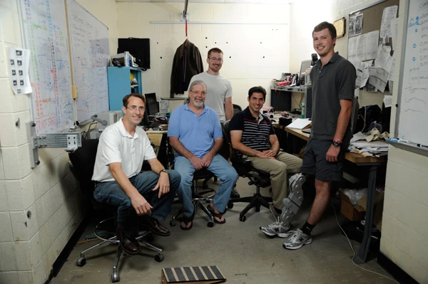 The team includes (l-r): Professor of Mechanical Engineering Michael Goldfarb; Embedded Research Engineer Don Truex; graduate research assistant Brian Lawson (back); Research Assistant Professor Atakan Varol; and Craig Hutto. Not pictured is research engineer Jason Mitchell (Photo: John Russell, Vanderbilt University)