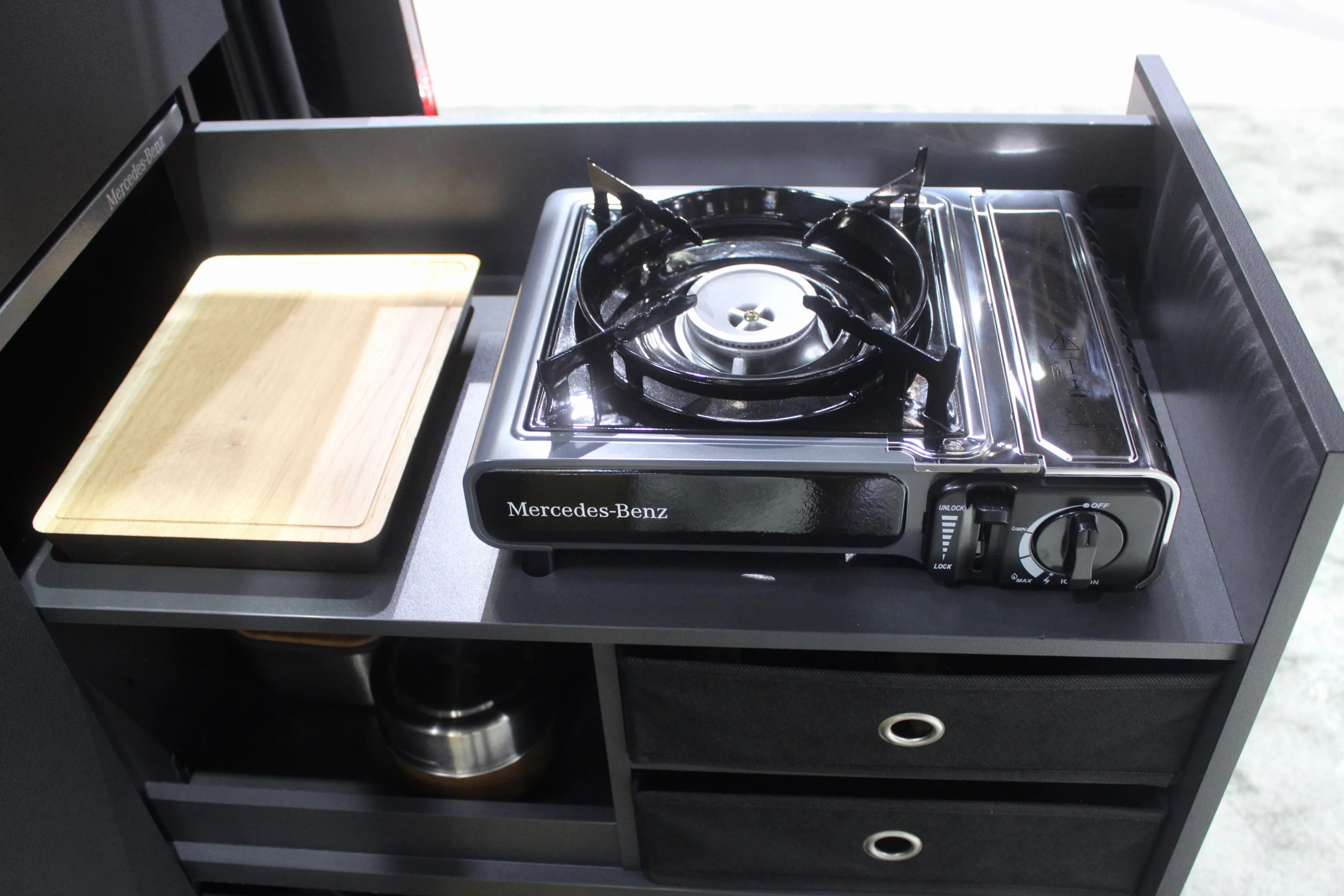 The Marco Polo Module uses a simple portable gas stove complete with Mercedes-Benz badging