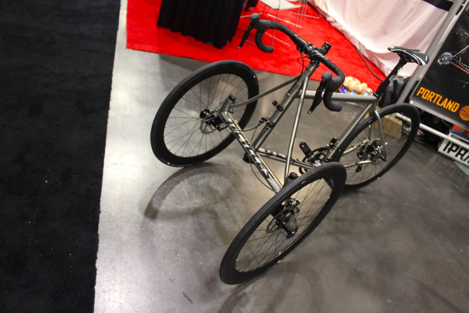 An upright titanium drop-bar tricycle, from Ti Cycles