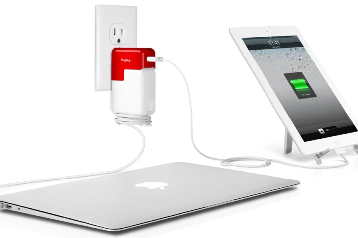 The PlugBug piggybacks on a MacBook adapter to provide a USB charge port for an iDevice