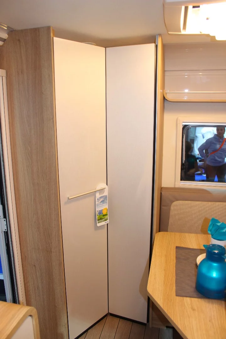 Knaus Travelino toilet room door in "unoccupied" position, keeping the interior more open