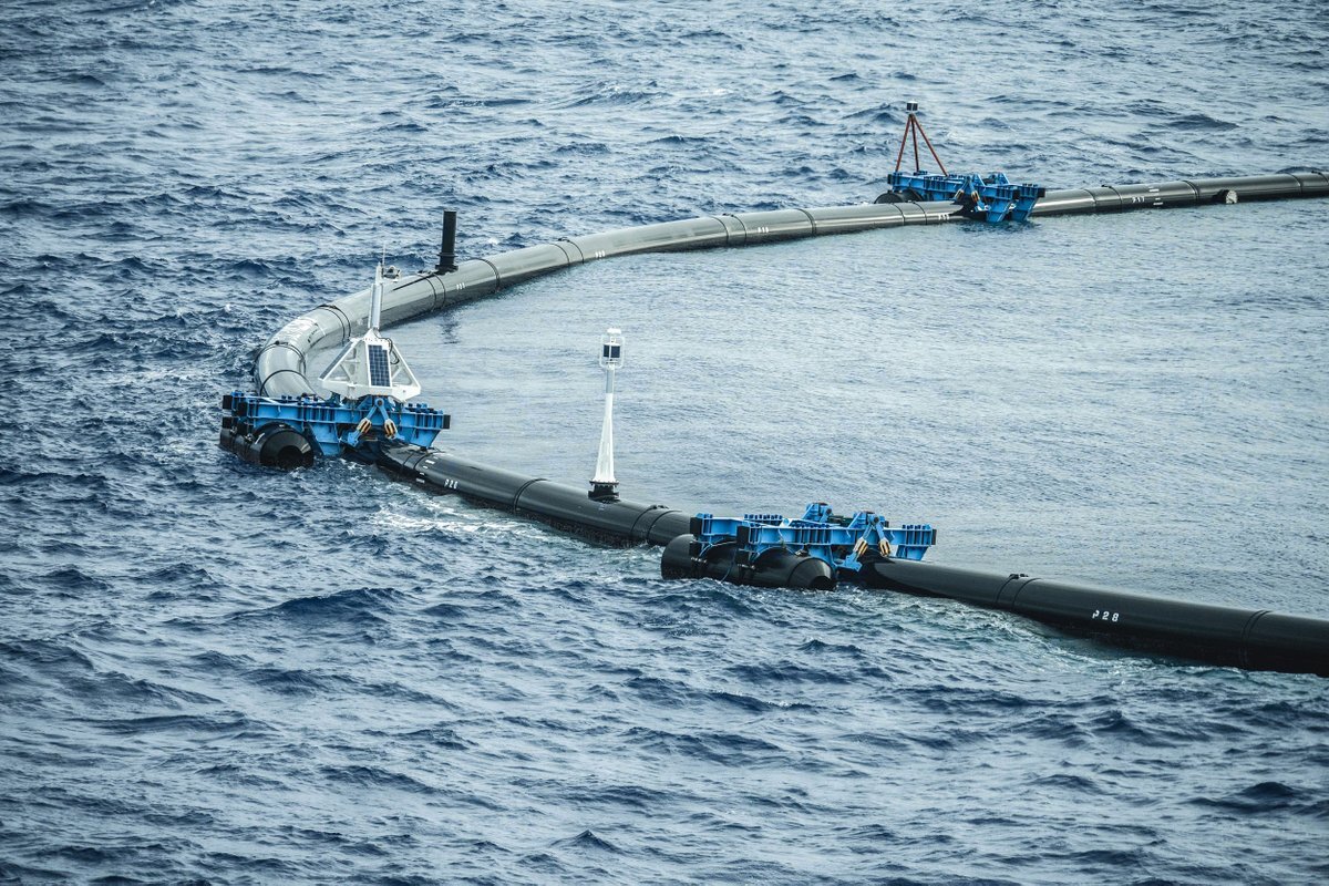 The Ocean Cleanup Project’s system is a giant U-shaped barrier designed to sweep through the Great Pacific Garbage Patch and collect plastic waste